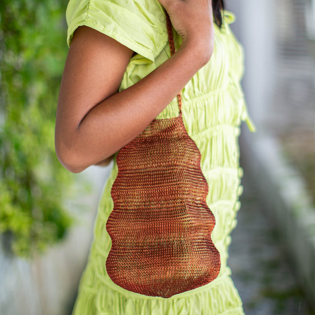 The Shell Bali Handwoven Wire Bag In Copper